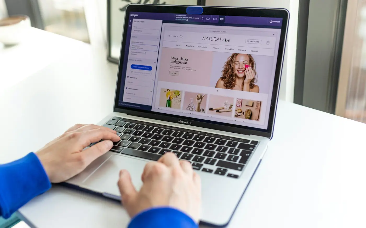 Person shopping on an online store on a laptop